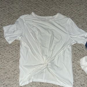 White Lululemon T-shirt with a knot in the front size medium